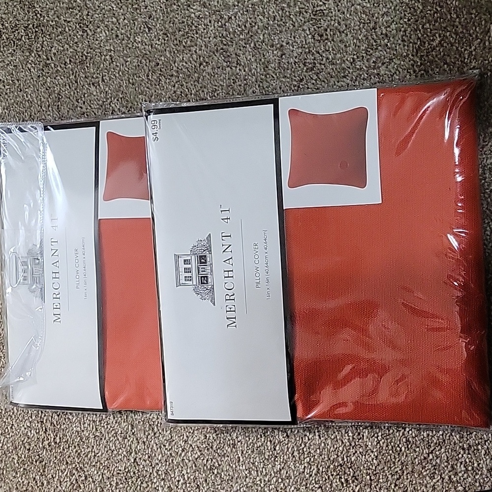 2 red, new in package throw pillow covers. 16 x 16.